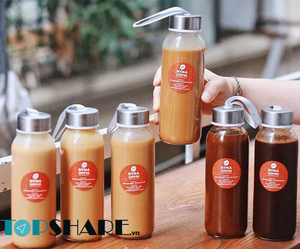 Chai thủy tinh 500ml nắp nhôm dây xách dùng đựng nước các loại.